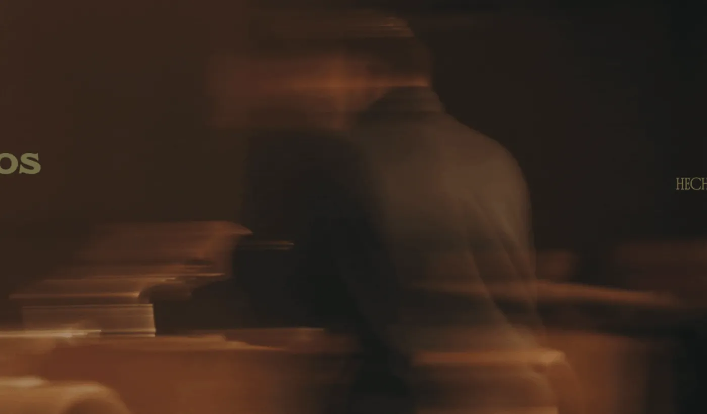 Hipólito brand film: a blurred figure moving through the dining room