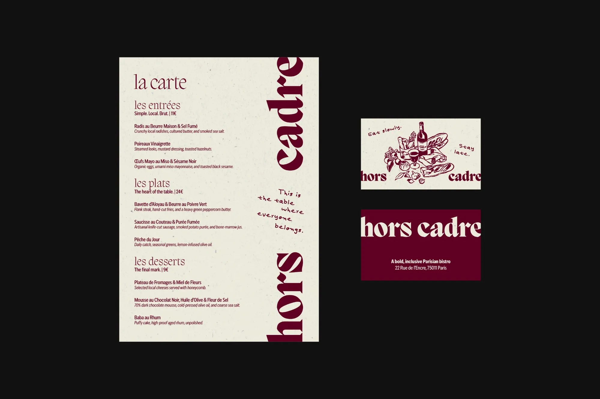 La carte menu and two Hors Cadre business cards on black